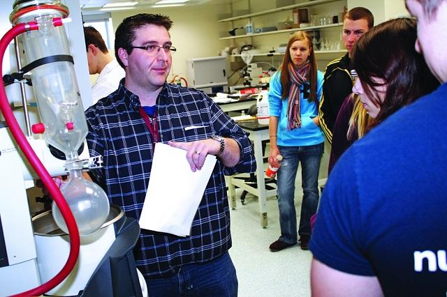 TBRHSC employee explaining molecular imaging to students