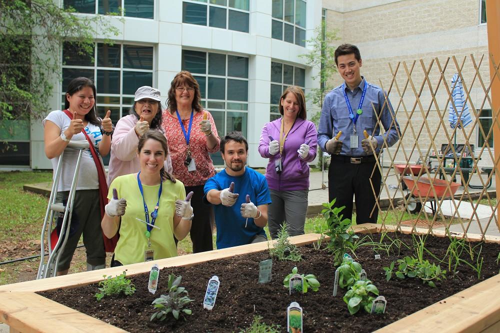 Patients and TBRSHC staff ‘thumbs-up’ the freshly planted vegetable gardens to be cared for and consumed by Mental Health Program patients as part of their therapeutic programming.