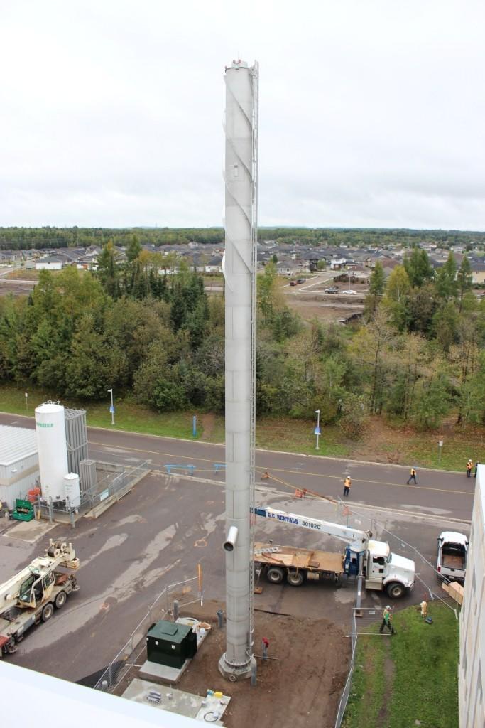 View of the 100-foot-tall stack component of TBRHSC’s new Combined Heat and Power (CHP)
