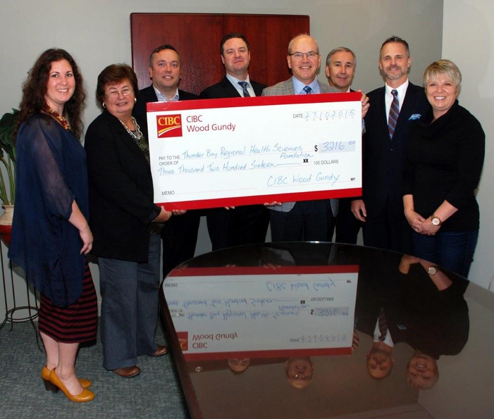Proudly presenting a gift of $3216 from the CIBC Children’s Foundation to fund the purchase of a new breastfeeding couch for the Lactation Consultant at the Maternity Centre at Thunder Bay Regional Health Sciences Centre are, centre, Investment Advisors from CIBC Wood Gundy, Kathy Sundell, Robert Seed, Fred Brown, Dan Peters, Greg Fayrik, and Paul Johnston, with, left, Erica Moorhouse, Manager, Maternal/Newborn, TBRHSC and, right, Liana Pretto, Lactation Consultant, TBRHSC. Missing are Investment Advisors Robin Smith and Shannon Zeleny.