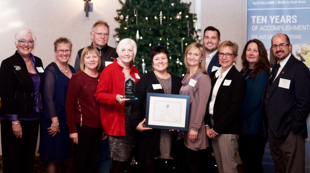 Members of the City of Thunder Bay Integrated District Network (IDN) Health Link Steering Committee receive the new North West LHIN Leadership Award for outstanding contributions to health system transformation in Northwestern Ontario.