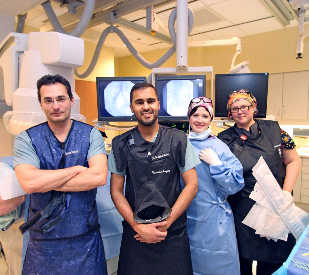 Members of the vascular team after a recent kissing stents procedure.