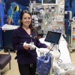 Mary Takacs, Charge Nurse in the Emergency Department shows the new advanced Bladder Scanner made possible by proceeds of the Thunder Bay 50/50 Draw. This new piece of equipment will enhance diagnostic accuracy and patient care in the Emergency Department.