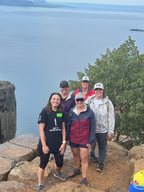 Angela Saunders (centre) with (L to R) Jolene Jarva, Jessica Dubinsky, Susie Ostrowski and Laura Kehl, her friends and Northwest Regional Cancer Centre staff, during the Terry Fox Sleeping Giant Hike.